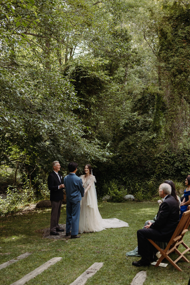 small wedding ceremony under trees at the village Big Sur
