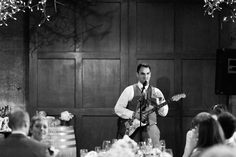 groom surprises bride with love song
