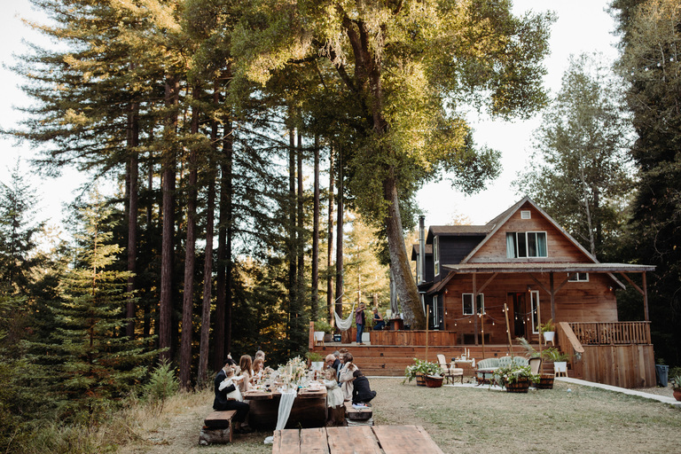 An intimate outdoor wedding reception under the redwoods at a wedding venue in the santa cruz mountains